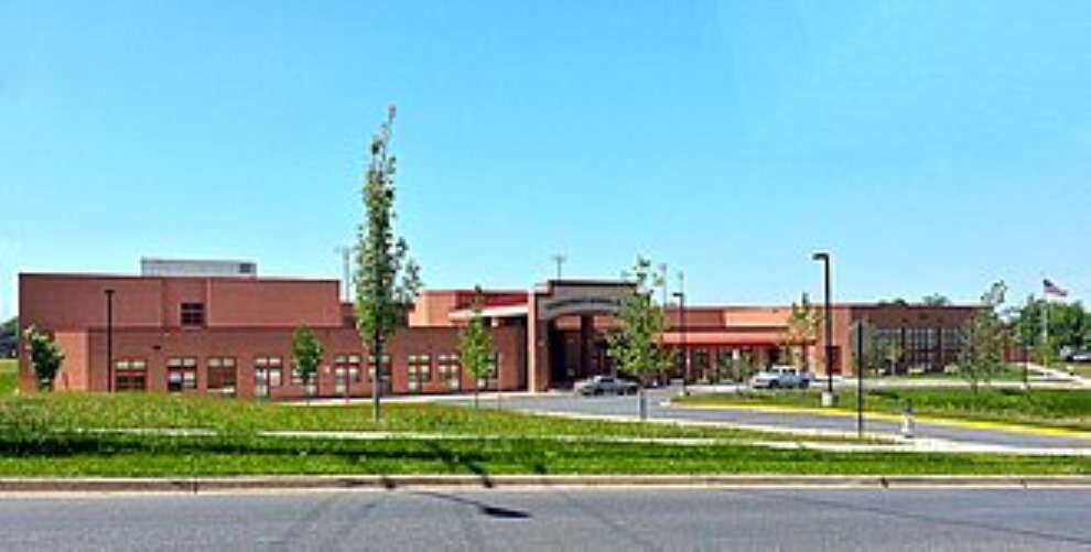 Greenbelt Middle School, low red-brick buildings