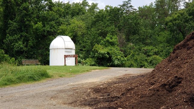 Our observatory, plus the edge of our mulch pile